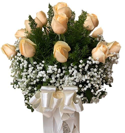 peach rose in vase 500x531